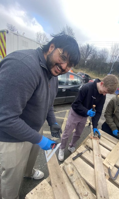 Image shows Year in Industry students creating'Bug Hotels' - 3