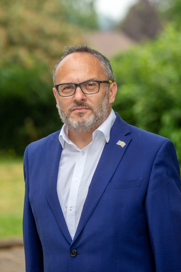 New befriending service for those affected by suicide: Cllr Morris Bright MBE