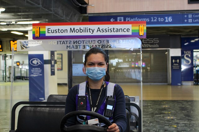 Customer service assistant Denisa wearing a face covering at London Euston