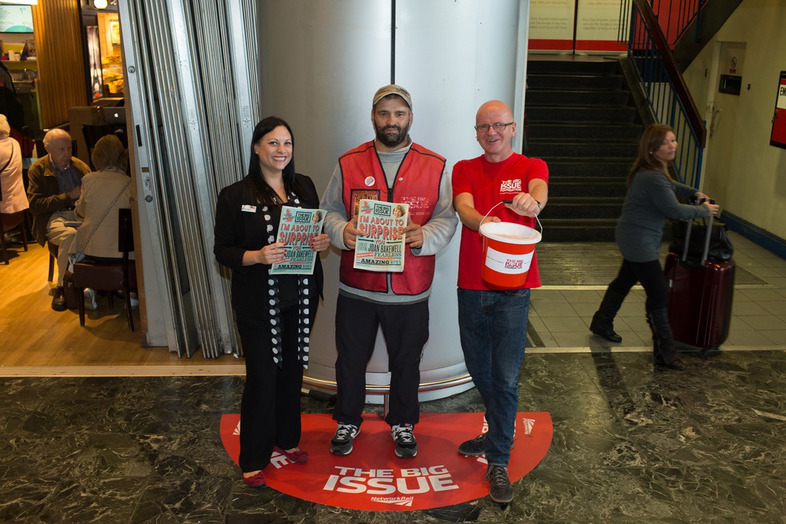 Big Issue vendor pitch: UK's first permanent Big Issue vendor pitch inside a station. Pictured: Rebecca Richards, Euston station support assistant, David Manso, Big Issue Vendor and Stephen Robertson, CEO of The Big Issue Foundation