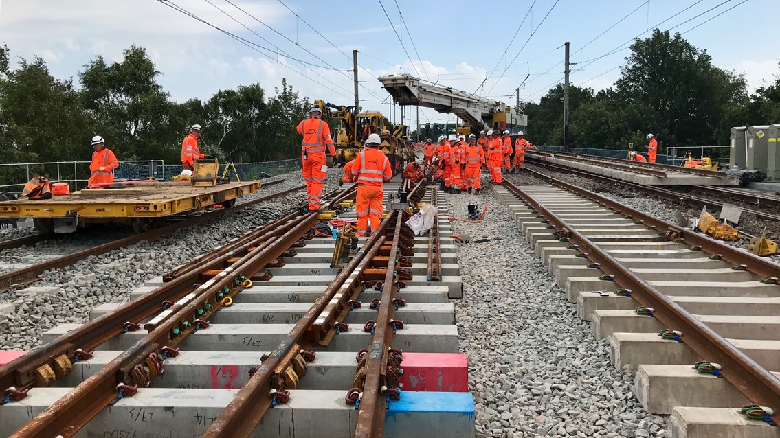Railway reopens after 16-day overhaul of key junction on West Coast main line: Workers on site during £27m renewal of Acton Grange junction