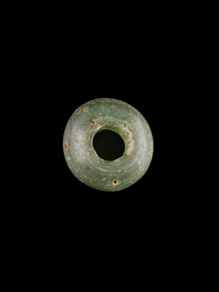 Marshill bead. Photo © National Museums Scotland