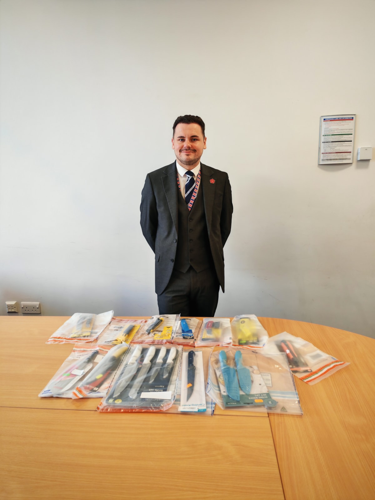 Cllr Joshua Roberts with some of the knives seized during Sceptre