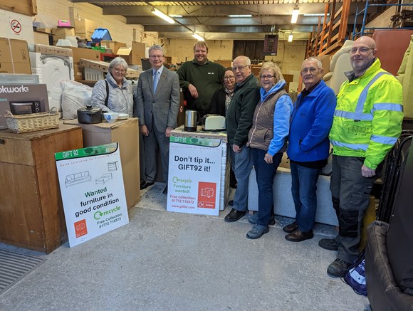Gift 92 and Selnet staff with Cllr Michael Green at Gift 92's warehouse