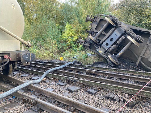 Cement being removed from derailed freight wagons in Carlisle