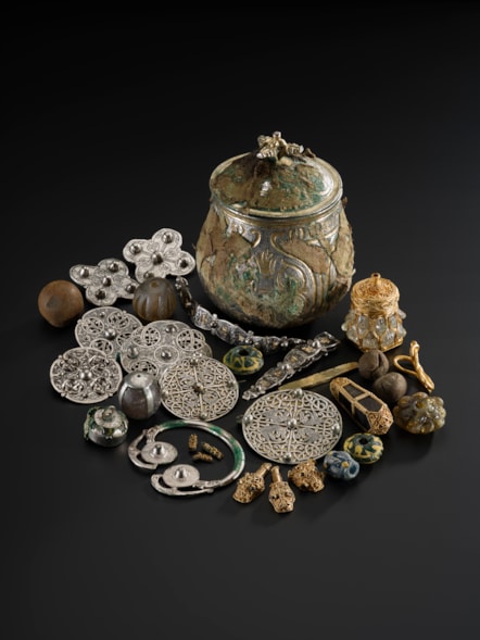 The lidded vessel from the Galloway Hoard and the Viking-age treasures it contained. Image © National Museums Scotland (2) (1)