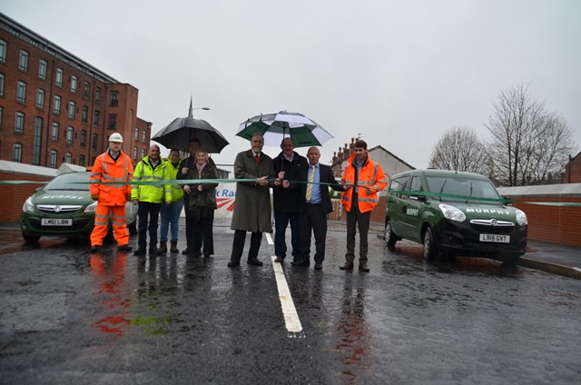 Manchester to Stalybridge electrification one step closer as Ashton-under-Lyne bridge rebuild completes over three weeks early: From left to right: Tameside Council's highways team; Cllr Peter Robinson; Danny O’Brien and Brendan McNeil from J.Murphy & Sons; and Steve Cooper from Network Rail