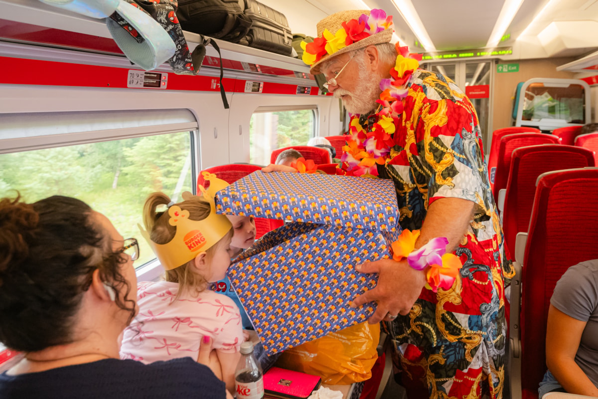 'Summer Santa' surprises young customers with Christmas presents on LNER train