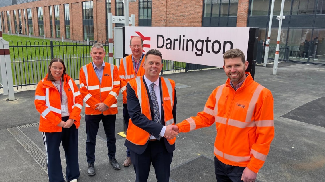 Network Rail's Luke Durston (right), hands over Darlington station to LNER's Steve Wilson on completion of the upgrade project in May