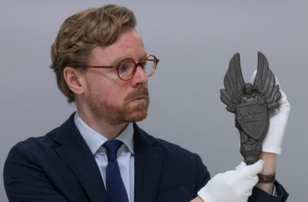 National Museums Scotland Curator Dr Calum Robertson with the cast iron angels. Image (c) Neil Hanna (4)