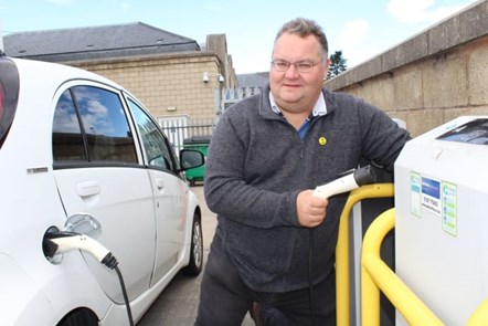 Cllr Leadbitter with electric car