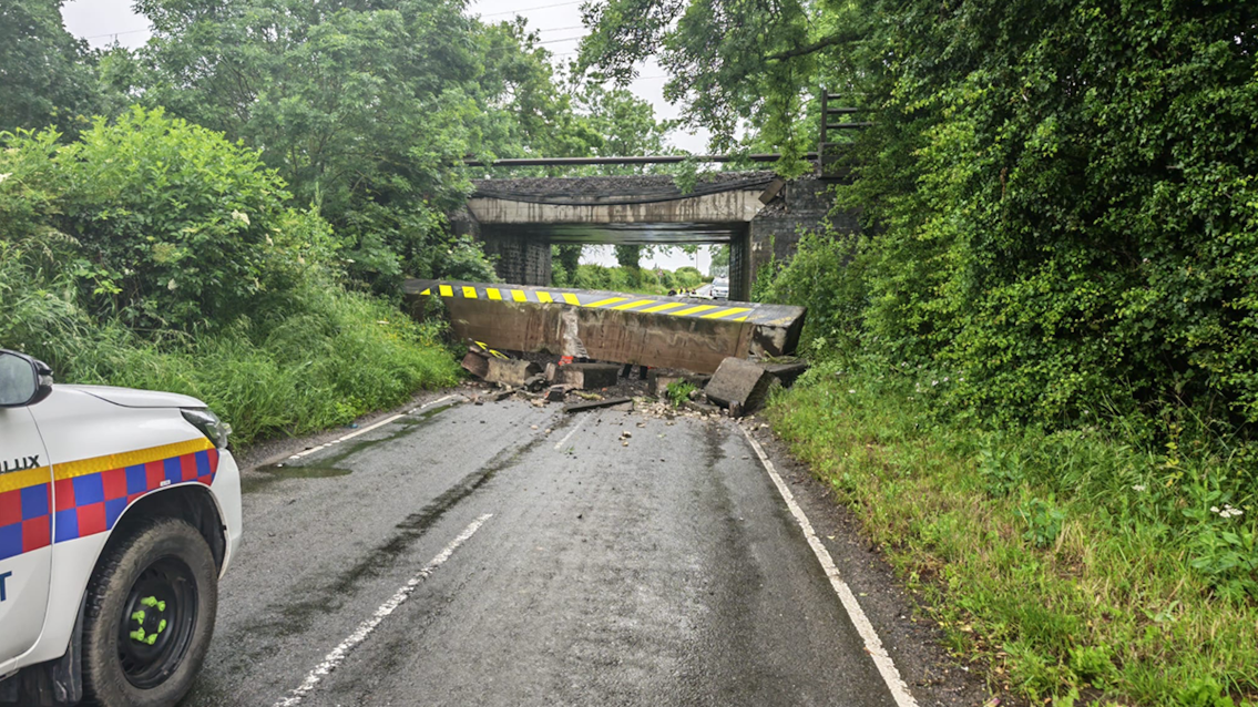 Passenger travel update following serious bridge collision between Rugby and Nuneaton: Image shows significant damage to railway bridge in Bedworth