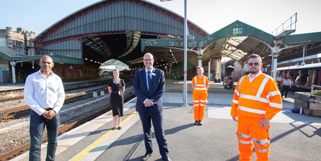 Contract signing kick-starts a cleaner, brighter future for Bristol passengers: Bristol Temple Meads - roof signing on Platform 3
