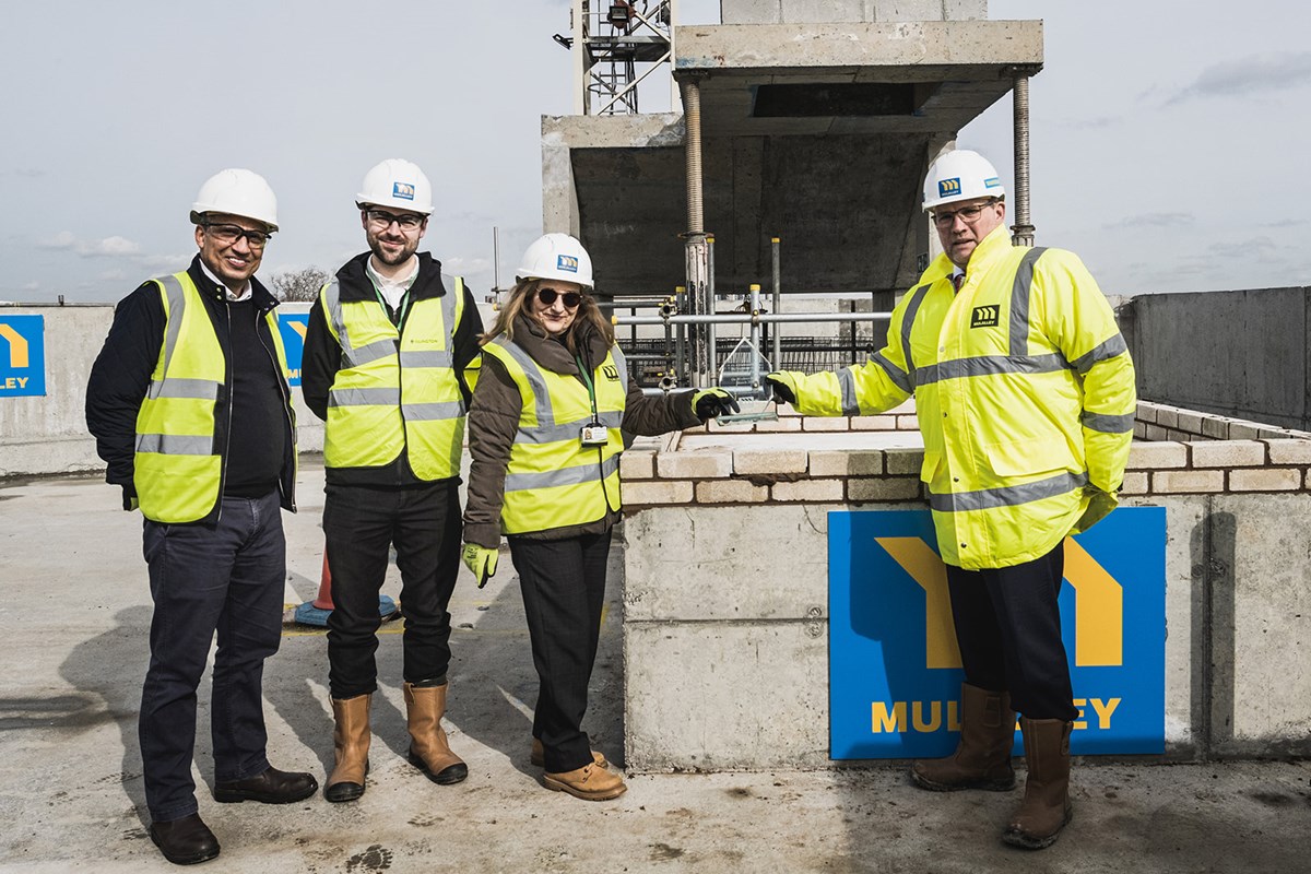 Council officers and Martin Barnes (Mulalley) at the Park View Estate topping out ceremony