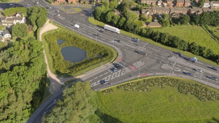 A CGI of the proposals for the Croston Road and A582 junction with a new pond on the left of the junction and the new layout from the air.