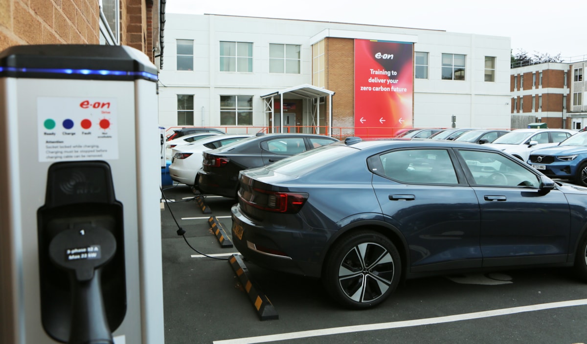 Exterior shot of electric vehicle (EV) charging vehicles outside E.ON's Net Zero Training Academy in Kingswinford, UK.