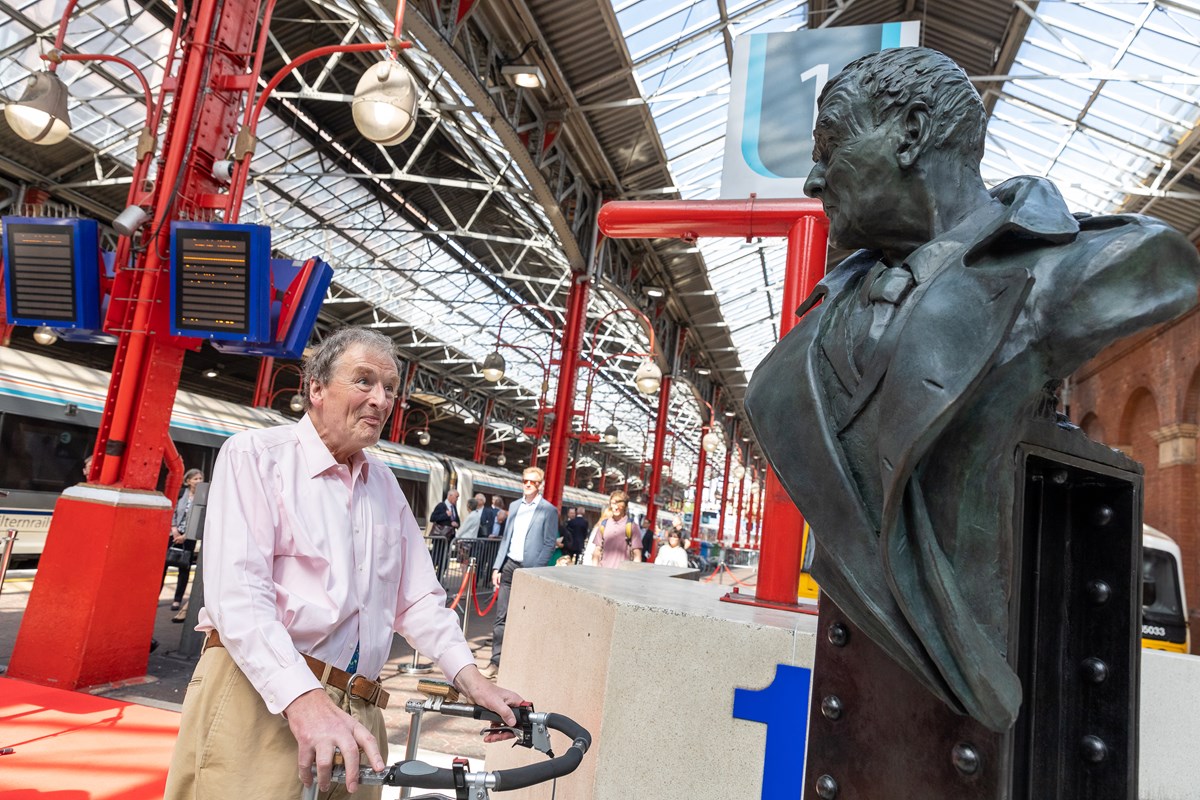 Adrian Shooter with statue