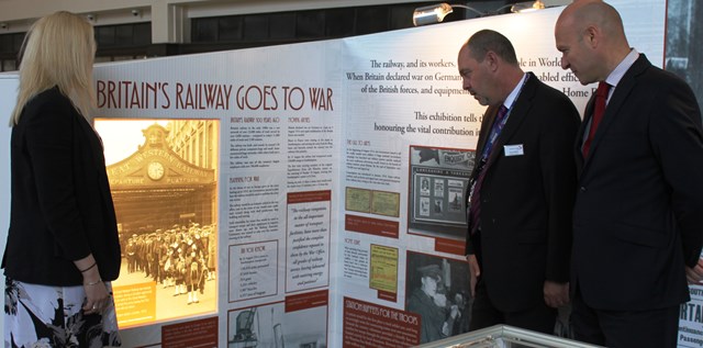 Carolyn Watson, Andy McNeil and Warrick Dent read the WW1 exhibition at Leeds station
