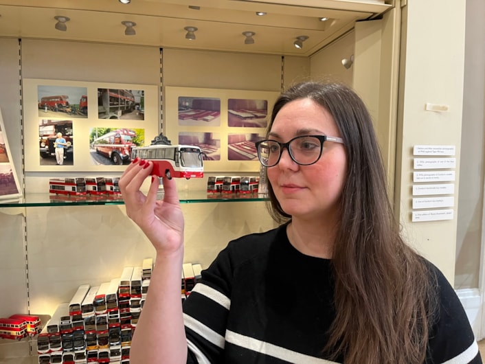 Bus collection: Assistant community curator Sapphia Cunningham-Tate alongside the new display at Leeds City Museum which gives visitors a chance to see a selection of the vast array of replicas created by physicist Dr Gordon Brooke.
The meticulously detailed models each relate to a specific real-life equivalent, complete with service number and with every painstaking detail reproduced using card, packaging and acetate for the windows.