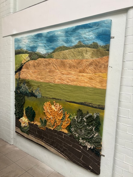 Looking Out of a Window textile embroidered wall hanging Sheffield Train Station for ArtWorks Together International Festival 2026 Jodie Cooper 2026 Photo credit Art