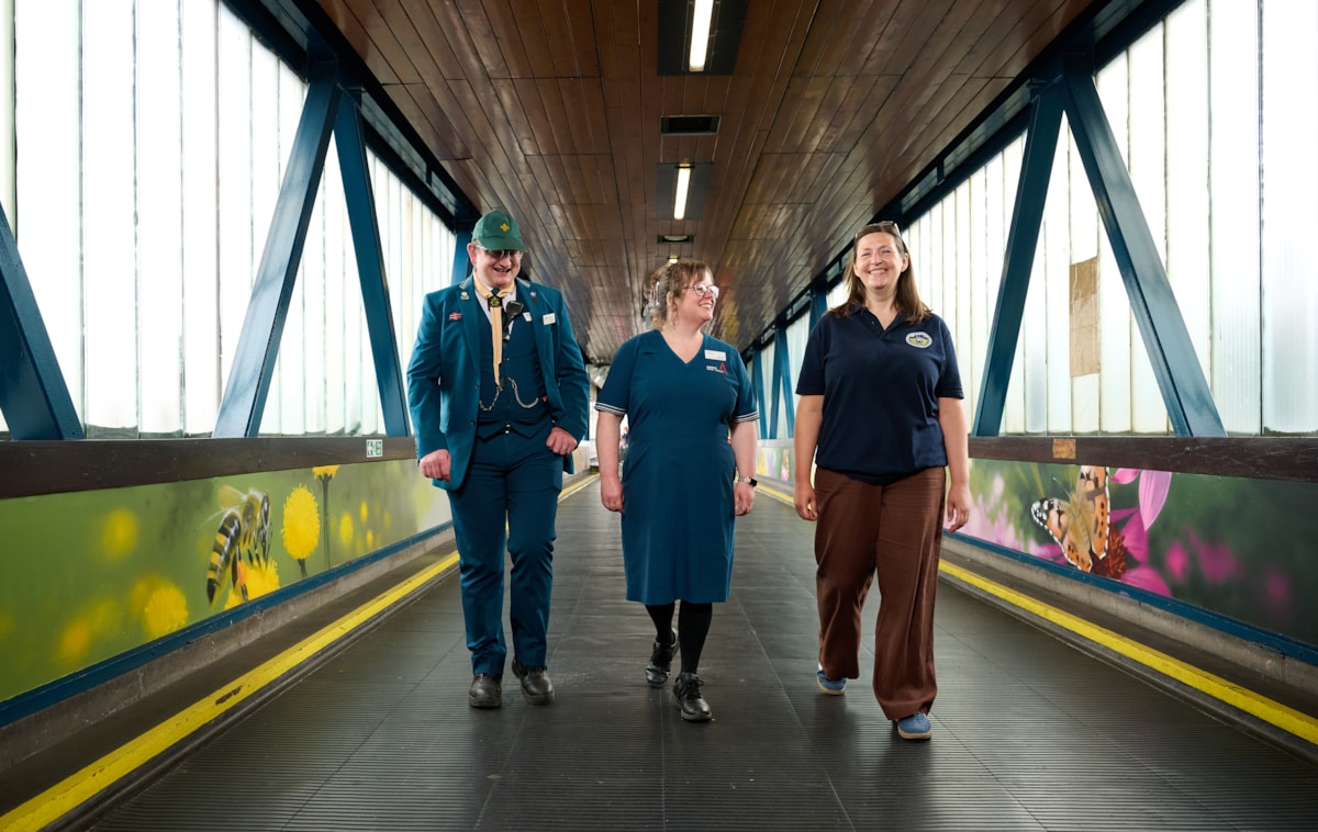 Justin Williams, Fiona Main and Emma McIntosh surrounded by Tom Edwards' artwork.