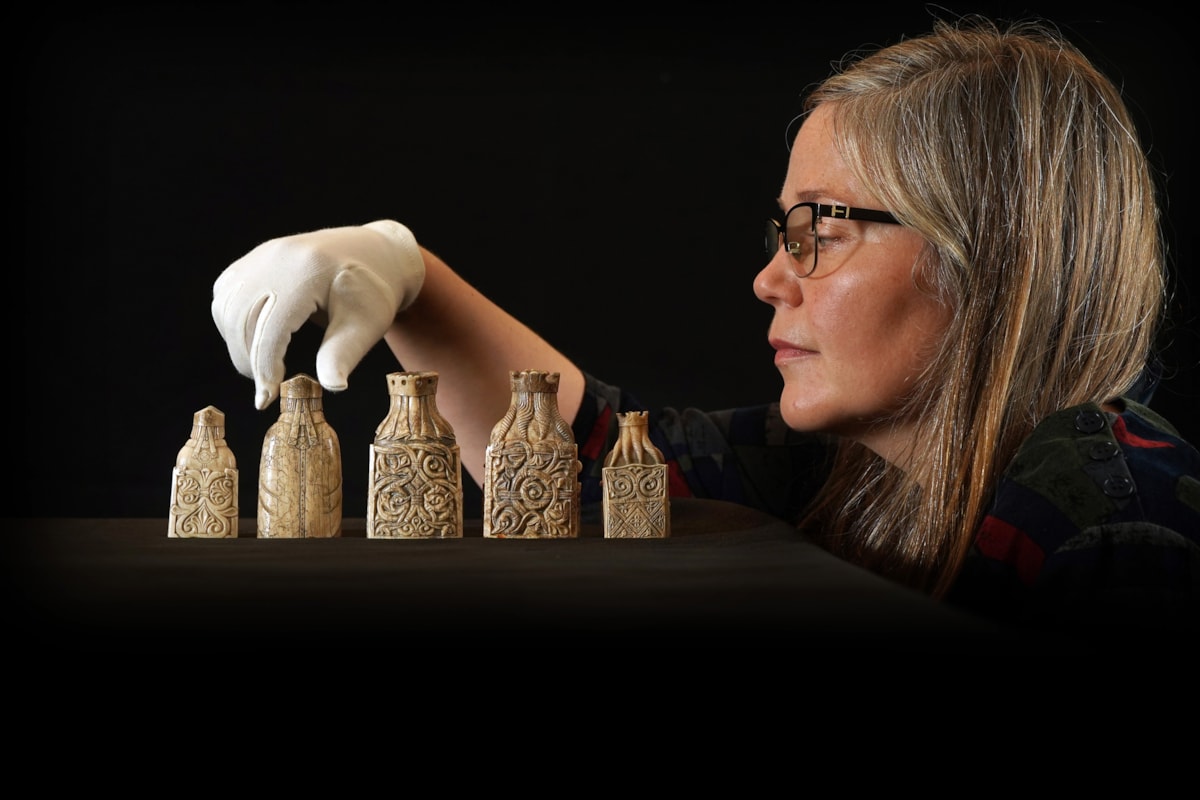 Dr Alice Blackwell with some of the Lewis chess pieces. Copyright Stewart Attwood (3)