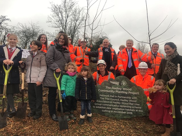 Rail Minister Andrew Jones MP, John Varley, representatives from Network Rail and members of Hadley Wood community at the launch of the Hadley Wood community planting project