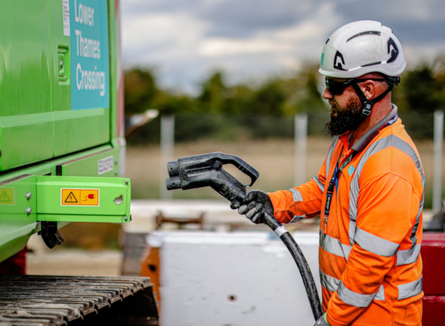 Plugging in to charge electric equipment at the Lower Thames Crossing site