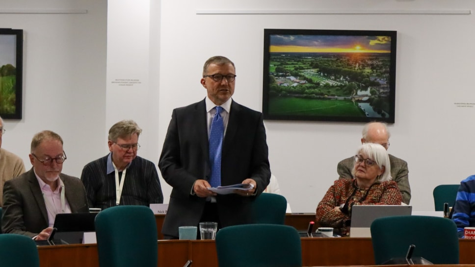 Cllr Mike Evemy at a Full Council meeting discussing LGR proposals