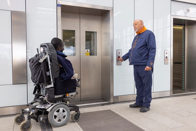 TfL Image - A customer in a motorised wheelchair uses a London Overground lift