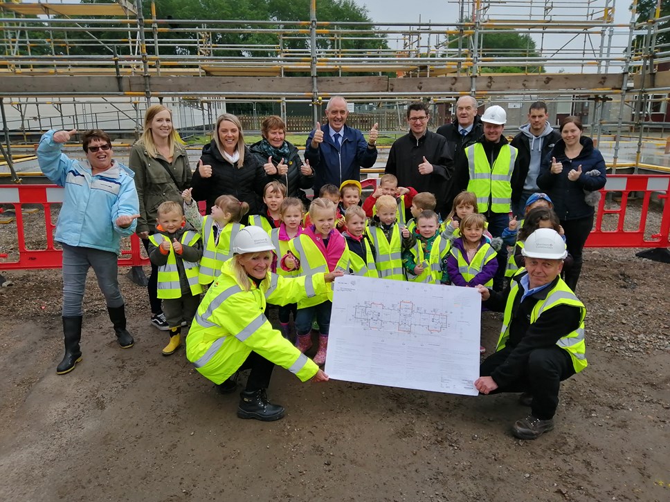 Pilmuir Nursery Children and parents see the plans for their new nursery on site