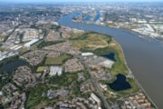 Image - Aerial view of development area across the river: Image - Aerial view of development area across the river