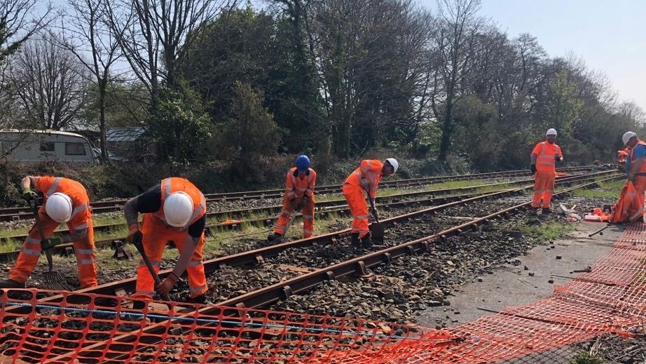Volunteers assisting with the track upgrade