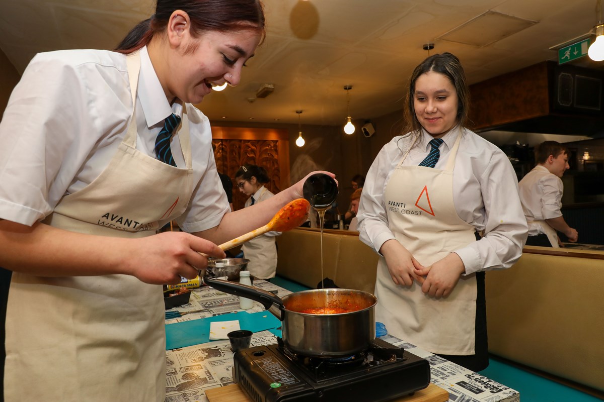 Pupils from COOP Academy, Stoke-on-Trent at their Feel Good Field Trip in the Curry Mile, Manchester.