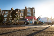 TfL Image - Person cycling along a temporary TfL cycle lane in Greenwich