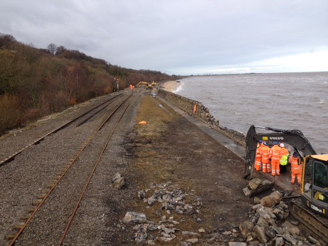 work starts to repair storm damage near Mostyn on the North Wales coast, December 6