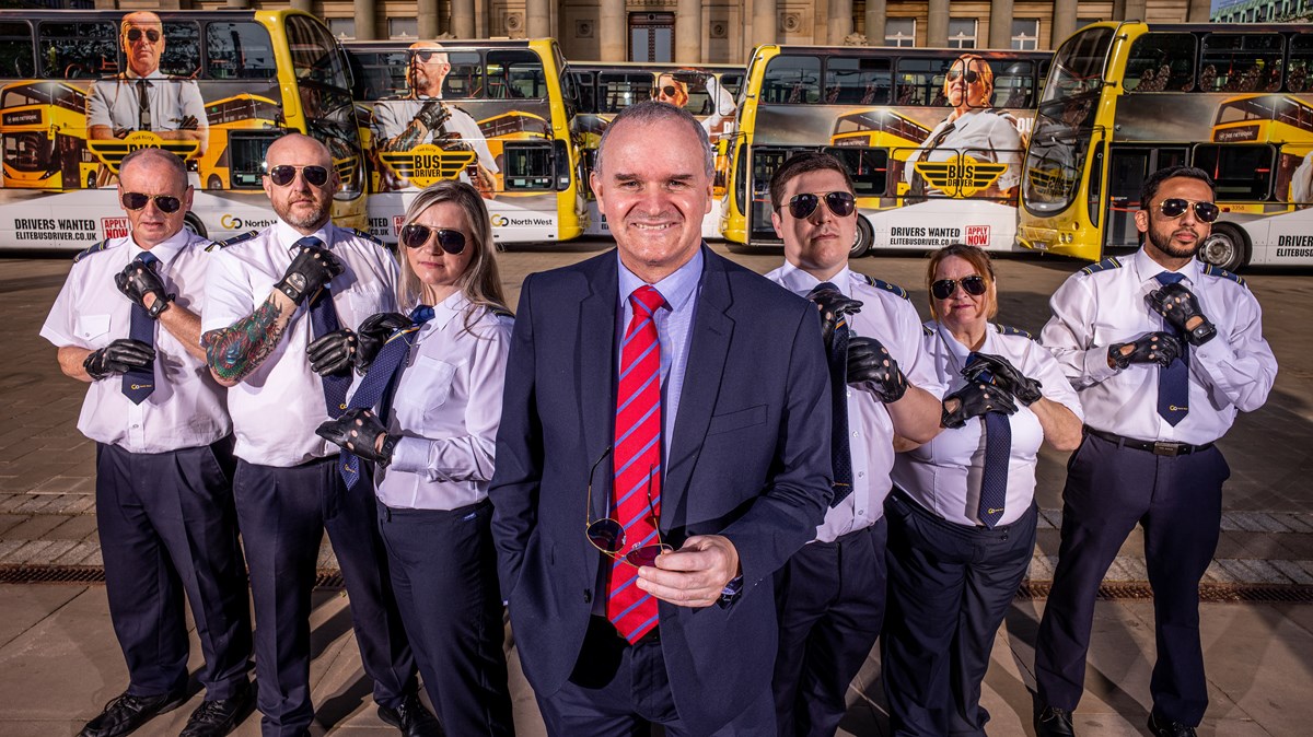 Nigel Featham, Managing Director of Go North West, with drivers at the launch of a campaign to recruit 300 bus drivers for Manchester's new integrated transport network.