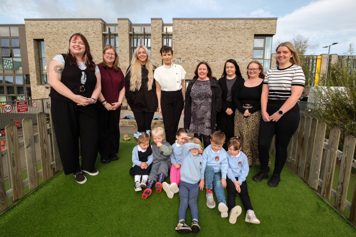 Julie Clelland with her team and Carol McGregor from Early Years celebrate their inspection report