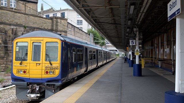 A Northern train stands at Bolton station: A Northern train stands at Bolton station