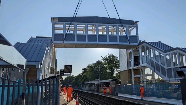 Bridging the gap: Latest pictures show major milestone reached in improving accessibility at Bexley station in Kent: Bexley bridge span lifted in
