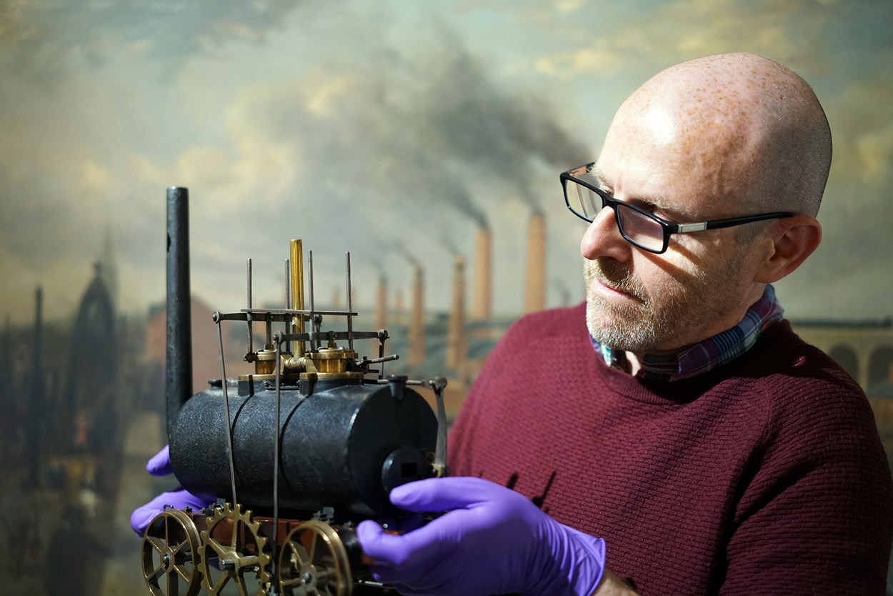 Salamanca returns: John McGoldrick, Leeds Museums and Galleries curator of industrial history, with the model of Salamanca, the world's oldest model of a locomotive.