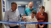 Sir Andrew Morris, Jamie French, Antony and his mother Mary at the opening of the new paediatric audiology facility at the Horton General Hospital: Sir Andrew Morris, Jamie French, Antony and his mother Mary at the opening of the new paediatric audiology facility at the Horton General Hospital