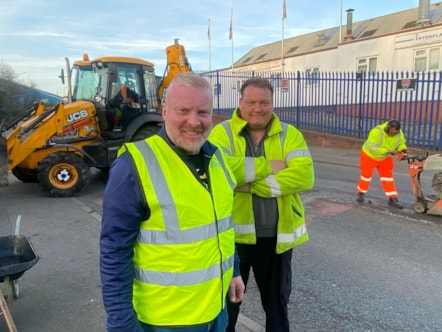 Cllr Damian Corfield with lead contractor Nicky Day at the night time blitz on potholes in Peartree Lane, Netherton