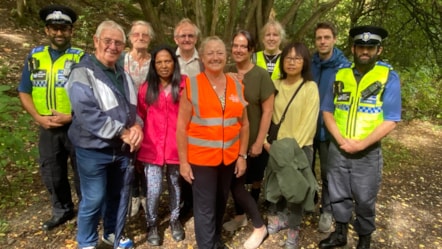 Walk leader Debbie Parkes (orange high-vis) with Councillor Andrea Goddard (Left of Debbie) and local community walkers LS