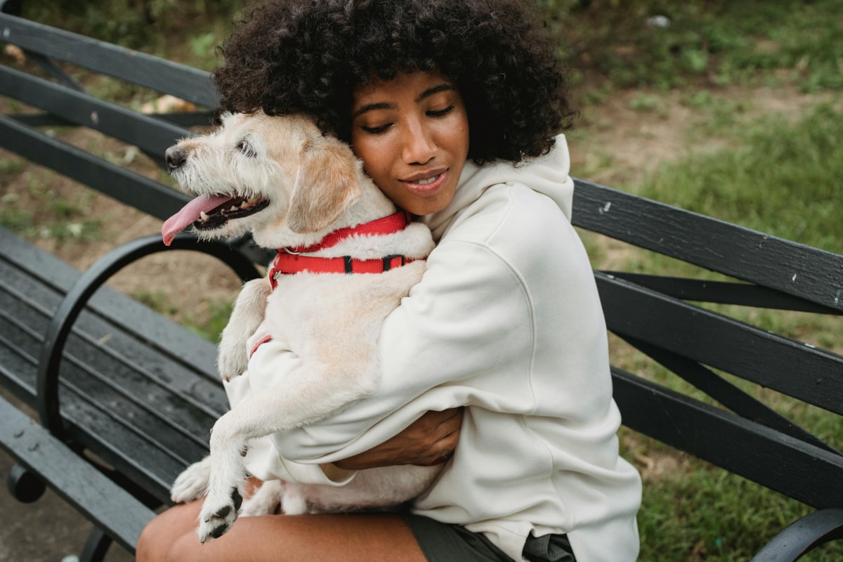 Woman hugging dog