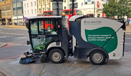 One of Islington Council's electric street sweepers out cleaning the streets in Angel