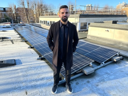 Cllr Mete Coban at one of Hackney Light and Power's solar projects in Hackney