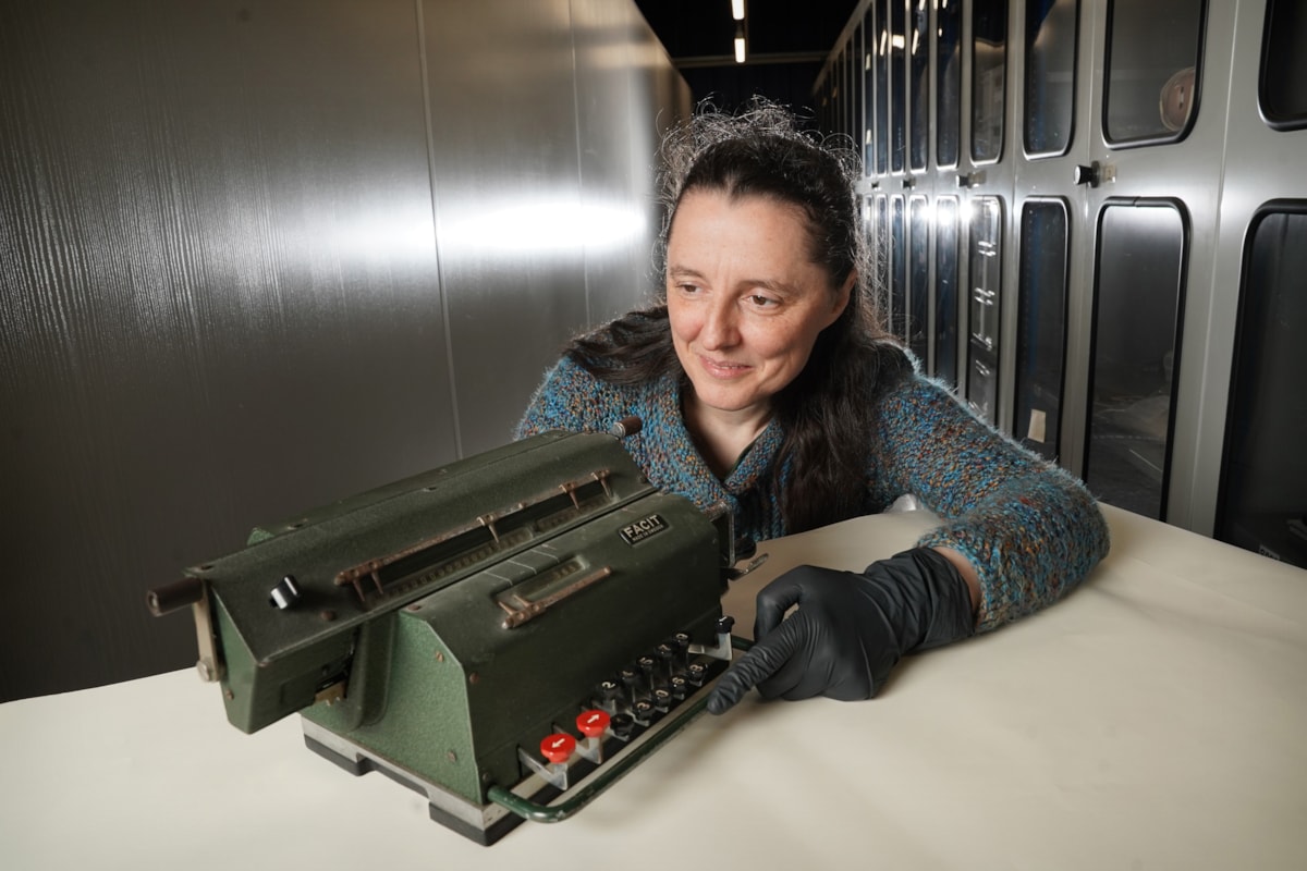 Dr Tacye Phillipson, Senior Curator of Modern Science at National Museums Scotland, with the Facit Model LX calculator