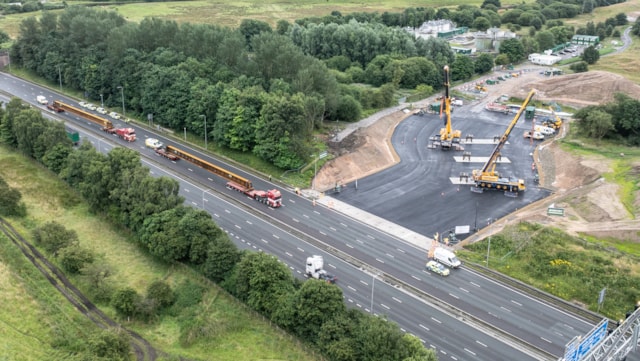 Passengers and motorists reminded of major rail and M62 motorway closures in September: Aerial view of the beams entering the work site