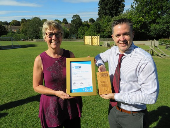 Hertfordshire primary school scoops national award for its sustainable travel drive: Janet Reeve and Ross Butcher - Modeshift award